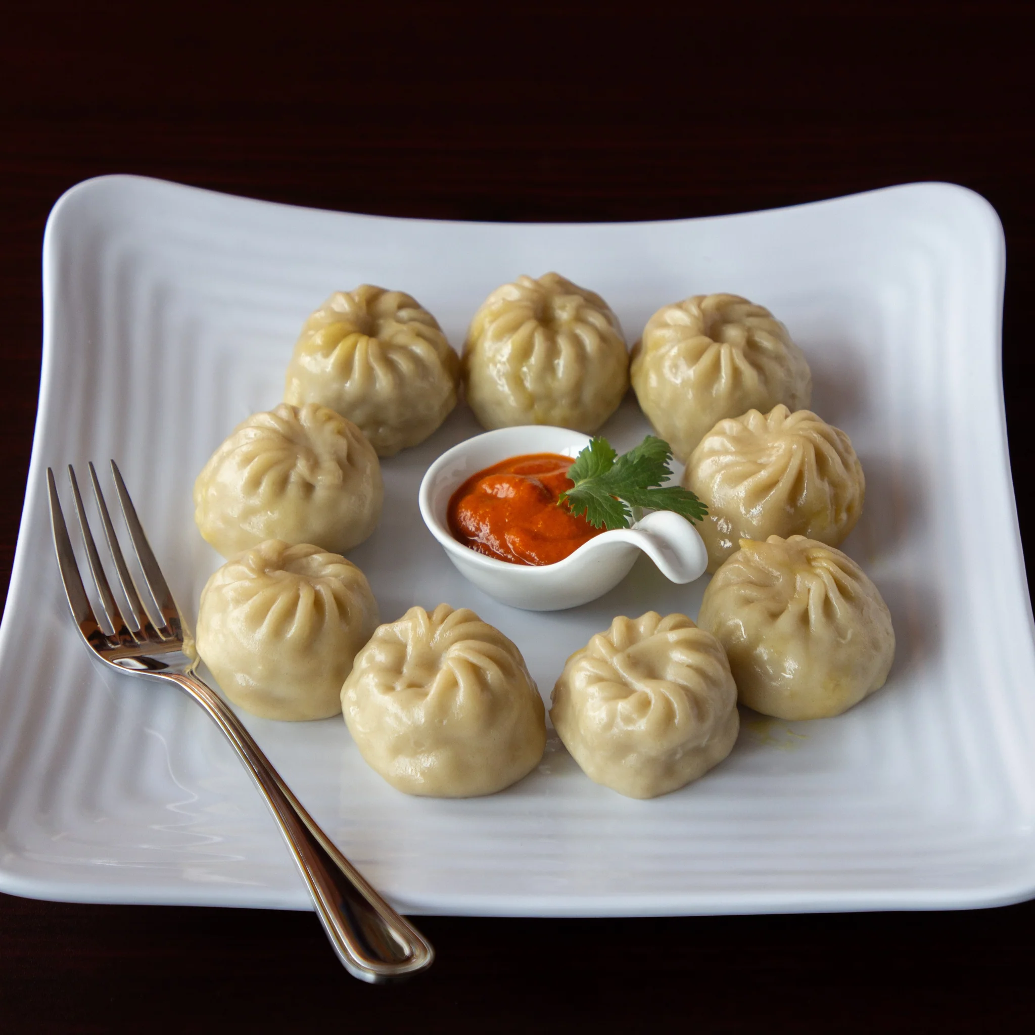 Momos (12-14 pcs with Momo sauce - Himalayan Style Hot Sauce)